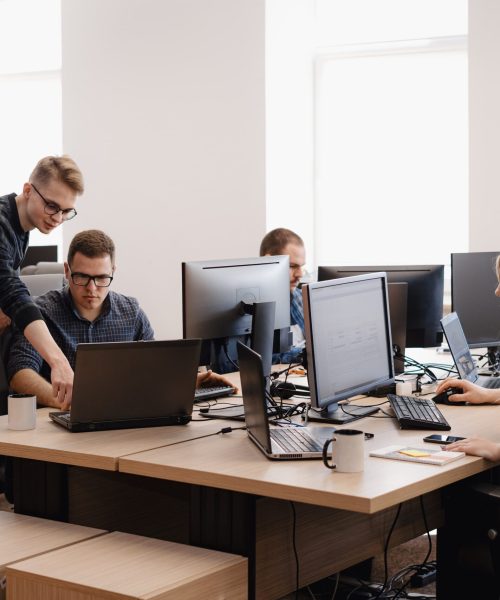 group-young-business-people-working-office-min